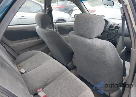 2002 Toyota Corolla Le из США, поврежденный, VIN 2T1BR12E82C545451